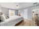 Bedroom featuring a large window allowing natural light to illuminate the space at 17454 Se 81St Newberry Ct, The Villages, FL 32162