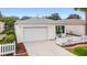Beautiful single Gathering home with garage and white picket fence at 17454 Se 81St Newberry Ct, The Villages, FL 32162