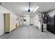 Clean garage with washer, dryer and storage units at 17454 Se 81St Newberry Ct, The Villages, FL 32162