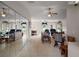 Bright and airy living room featuring a mirrored wall for expanded visual space at 11053 Se 174Th Loop, Summerfield, FL 34491
