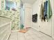 Bathroom featuring granite countertops, tile floors, and a stand up shower at 1209 Demoiselle St, Groveland, FL 34736