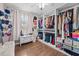 Spacious walk-in closet with custom shelving and ample storage space at 1212 Windy Bluff Dr, Minneola, FL 34715