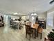 Open living area with updated kitchen, dining space, and living room at 127 Hibiscus Way, Leesburg, FL 34748