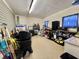 Spacious garage featuring shelving and storage space at 127 Hibiscus Way, Leesburg, FL 34748