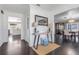 Welcoming foyer with hardwood floors leading to dining area and kitchen at 12802 Amber Ave, Clermont, FL 34711