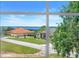 Beautiful view of neighboring houses and the lake from a window at 12802 Amber Ave, Clermont, FL 34711