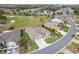 Panoramic aerial view of the property's prime location near the golf course at 13146 Se 91St Court Rd, Summerfield, FL 34491