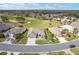 Wide aerial view of the home showcasing its desirable location and manicured landscaping at 13146 Se 91St Court Rd, Summerfield, FL 34491