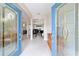 Grand foyer with tile flooring, an elegant piano, and an open view into the living spaces at 13146 Se 91St Court Rd, Summerfield, FL 34491