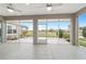 Enjoy the view from the lanai with ceiling fans, and beautiful view of the golf course and lush landscaping at 13146 Se 91St Court Rd, Summerfield, FL 34491