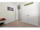 Bedroom with plush carpet and spacious closet at 140 S Zuni Rd, St Cloud, FL 34771