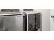 Stainless steel front-load Samsung washer and dryer set are found in this home's laundry area at 140 S Zuni Rd, St Cloud, FL 34771