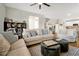 Bright living room with stylish decor, comfortable seating, and open floor plan at 140 S Zuni Rd, St Cloud, FL 34771