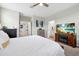 Serene main bedroom with a TV and decorative fireplace, providing a retreat-like atmosphere at 140 S Zuni Rd, St Cloud, FL 34771