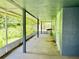Long back porch with screened-in enclosure at 15747 Old Highway 50, Clermont, FL 34711