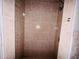 A tiled standup shower at 15747 Old Highway 50, Clermont, FL 34711