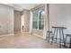 Bright bonus room with neutral tile flooring and views of backyard at 1603 Brookstone Ln, Fruitland Park, FL 34731