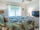 Bedroom with a large window at 1617 Lakewood Dr, The Villages, FL 32162