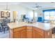 Open-concept living area with dining space, creating a bright and airy atmosphere at 1617 Lakewood Dr, The Villages, FL 32162