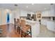 Kitchen with stainless steel appliances, a breakfast bar, and pendant lighting at 16865 Se 94Th Sunnybrook Cir, The Villages, FL 32162