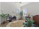 Office with hardwood floors, a ceiling fan, and lots of natural light at 17204 Se 112Th Court Rd, Summerfield, FL 34491