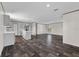 Open floor plan showing living room and kitchen, with modern finishes at 17442 Eve Dr, Montverde, FL 34756
