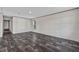 Bright living area with newly installed floors, clean walls, and large windows for a comfortable living space at 17442 Eve Dr, Montverde, FL 34756