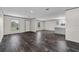 Newly installed flooring, clean walls, and sunlit windows create a bright and inviting open living space at 17442 Eve Dr, Montverde, FL 34756