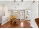 Comfortable dining area with wood floors, connecting to the kitchen, and closet at 1854 W Schwartz Blvd, Lady Lake, FL 32159
