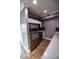 View of kitchen with stainless refrigerator and white cabinets at 2026 Sunset Ln, Clermont, FL 34711