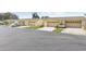 A row of well-maintained homes with attached garages showcase a tranquil neighborhood setting and inviting curb appeal at 2229 Cypress Ct # C-4, Tavares, FL 32778