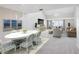 Open-plan living and dining room with views to the outside at 2229 Cypress Ct # C-4, Tavares, FL 32778