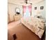 Comfortable bedroom featuring natural light and a spacious dresser at 224 Westwood Dr, Leesburg, FL 34748