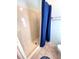 Clean shower stall with blue curtain in well-lit bathroom at 224 Westwood Dr, Leesburg, FL 34748
