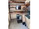 Interior storage room with shelving and storage bins for all of your storage needs at 224 Westwood Dr, Leesburg, FL 34748