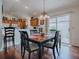 Cozy dining area adjacent to the kitchen, offering a warm and inviting atmosphere for meals and gatherings at 2367 Camden Ter, The Villages, FL 32162