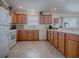 Bright kitchen with tiled floors, plenty of room for Gathering gatherings at 2367 Camden Ter, The Villages, FL 32162