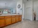 Open kitchen layout offering ample countertop space for prepping and cooking at 2367 Camden Ter, The Villages, FL 32162
