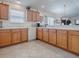 Spacious kitchen with tiled floors, a perfect place to gather and make memories at 2367 Camden Ter, The Villages, FL 32162