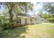 Charming single-story home featuring a covered carport and a front porch for relaxing outdoors at 2886 N C 470, Lake Panasoffkee, FL 33538