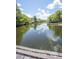 Picturesque lake view from a wooden bridge, capturing the serenity of the surrounding nature at 2886 N C 470, Lake Panasoffkee, FL 33538