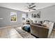 Cozy living room filled with natural light, featuring comfortable seating and modern decor at 303 Red Kite Dr, Groveland, FL 34736