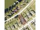 Aerial view showcasing property lots with clearly marked boundaries, adjacent to the lake and a quiet neighborhood at 3339 Landing Vw, Tavares, FL 32778
