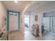 Welcoming foyer with a coastal theme, leading to various rooms in the house at 3339 Landing Vw, Tavares, FL 32778
