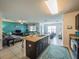 Stylish kitchen with a spacious island, stainless steel appliances, and an open layout at 3339 Landing Vw, Tavares, FL 32778