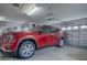 Modern garage interior with new SUV at 33409 Pennbrooke Pkwy, Leesburg, FL 34748