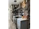 Modern kitchen with stainless steel appliances and wood plank style accent wall at 37149 Grays Airport, Lady Lake, FL 32159