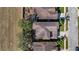 Aerial view of rooftops and the surrounding neighborhood layout at 412 Arbor Pointe Ave, Minneola, FL 34715
