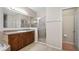 Bathroom featuring a tiled shower, vanity and toilet at 412 Arbor Pointe Ave, Minneola, FL 34715