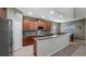 Well-appointed kitchen featuring stainless steel appliances and ample cabinet space at 412 Arbor Pointe Ave, Minneola, FL 34715